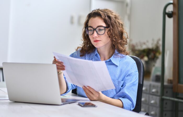 young woman reviewing documents